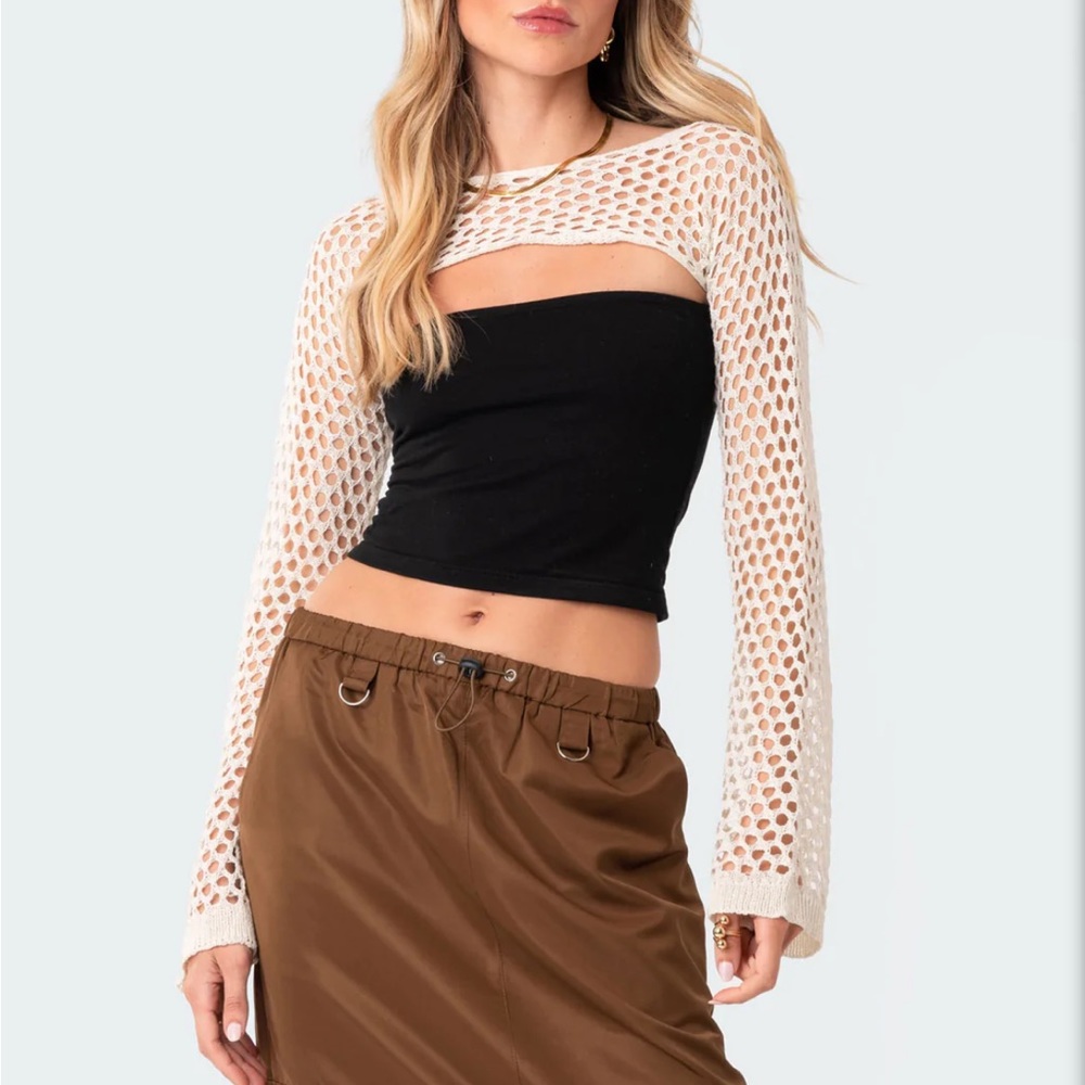 Cream colored shoulder shrug sleeve top